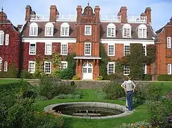 Sidgwick Hall and the sunken garden of Newnham College.