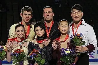 The pairs medalists at the 2014 Skate America