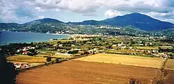 The coastline of Marina from the Plain of Velia. In background Casal Velino (on the mountain), Pioppi (left corner, by the sea), Pollica (above Pioppi), and the Stella Mountain (the highest one)