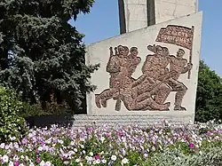 Soviet-era memorial with flower bed, Bender