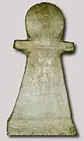 Stele in the form of a Tanit sign with bottle sign.