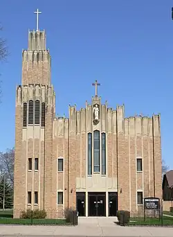 Art Deco church with statue of St. Stanislaus on upper facade