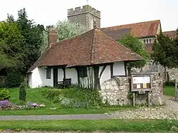 Timber-framed building in the south-west corner of the churchyard of Church of St Mary (Pest House)