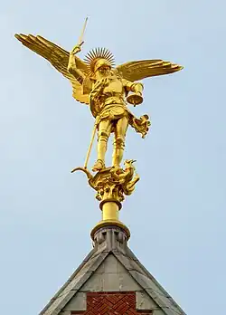 Statue of Archangel Michael slaying a dragon on the bell tower