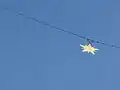 Close-up of the golden star hanging over Moustiers-Sainte-Marie