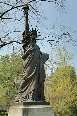 A 2.87 metres (9&nbsp;ft 5&nbsp;in) copy of the Statue of Liberty by Bartholdi, exhibited in 1900, placed in the Luxembourg Gardens in 1905