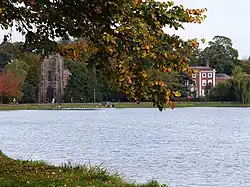 Photograph of Stowe Pool, with Stowe House in the background