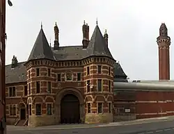 The French Gothic gatehouse of Strangeways Prison by Alfred Waterhouse.
