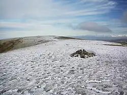 Looking along the summit ridge, from the cairn on the south top. The north top is on the skyline
