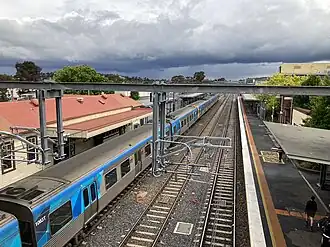 Southbound view of the station platforms, with a Comeng train at Platform 1, November 2022