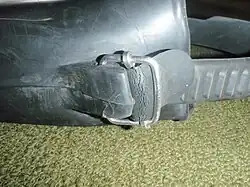 Swim fin strap attachment with simple rubber strap and wire buckle