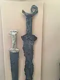Sword with a golden handle