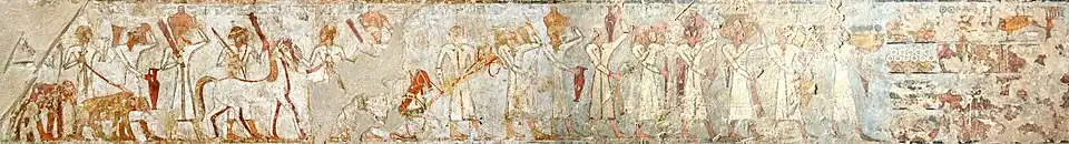 Syrians bringing presents to Tuthmosis III, in the tomb of Rekhmire, circa 1450 BC. They are labeled "Chiefs of Retjenu".[52][53]