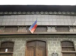Old house in Taal, Batangas; note the two smaller postigos inset in the large main door (puerto)