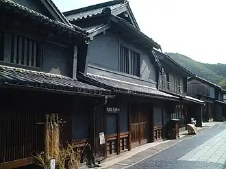 A row of black houses.