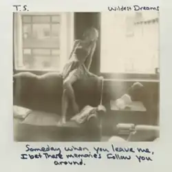 Cover artwork of "Wildest Dreams", a black and white polaroid photo of Swift sitting on the sofa, with some lyrics written on it
