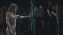 Screenshot of the video showing Swift being emblazoned by lightning while being hunted by black-clad mysterious creatures