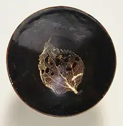 Jizhou ware tea bowl with natural leaf resist decoration and brown glaze, late southern Song dynasty, about 1200–1279