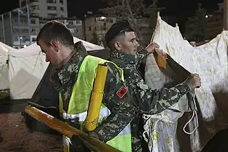 Members of the Albanian army involved in relief work