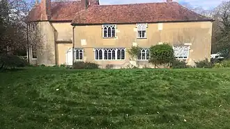 The Abbey as seen from the south with the labyrinth in front.