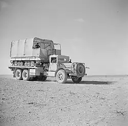 Mack EXBX transporting a disguised Valentine tank in North Africa