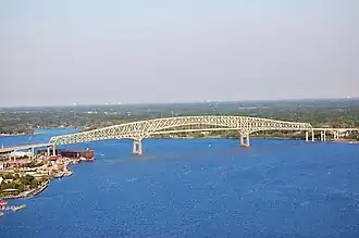 The Hart Bridge spanning the St. Johns River in Jacksonville, Florida, is a continuous, cantilevered truss bridge which combines a suspended road deck on the 332-metre (1,088&nbsp;ft) main span and through truss decks on the adjacent approach spans