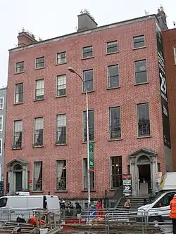 A four storey redbrick building