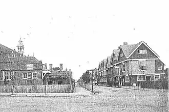 1881 photograph by Bedford Lemere, looking east along Bath Road. The Vicarage is still under construction, without a roof; there are as yet no corner shops in front of the Tabard.