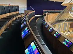 Two rows of bench type seating in a semicircle