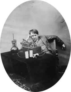 Thomas Edison in 1888 listening to a wax cylinder phonograph at the Edison laboratory, Orange, N.J.