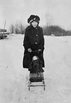 Woman pushing a stroller