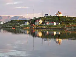 View of the Kåja island with Torsvåg Lighthouse off Vanna