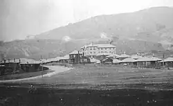 The company town with its hotel, restaurant, bar, houses, and cement processing plant c. the 1920s