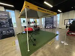 Frame tents are used at tailgate parties. This is a typical representation of one such tent, found in the Indianapolis Motor Speedway Museum.