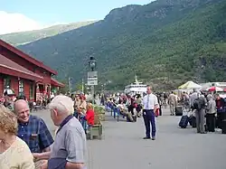 Tourists at the railway station in Flåm. The station has the village's only public toilets