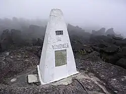 Tripoint marker where the borders of Brazil, Guyana, and Venezuela meet on top of Mount Roraima