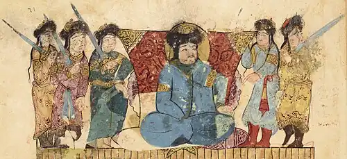 Turkic amir with guards in Maqamat al-Hariri, wearing the sharbush headgear, the three-quarters length robe, and boots, at Rayy, Iran, 1237.[137][138]