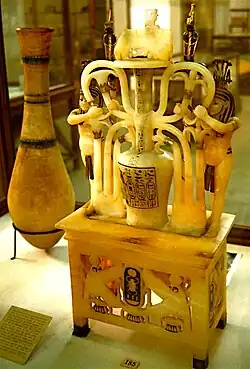 Alabaster jar depicting the sema tawy symbol with Hapy. From the tomb of Tutankhamun.