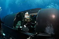 A member of SEAL Delivery Vehicle Team Two (SDVT-2) prepares to launch a Mark 8 SDV from Los Angeles-class attack submarine USS&nbsp;Philadelphia