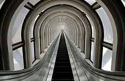 The escalator crossing the wide atrium-like space