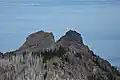 Unicorn Peak seen from Hurricane Hill, with Strait of Juan de Fuca in the distance.