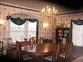 This dining room was added by Judge James' son, Burt, on the first floor, at a later date along with the third floor addition.