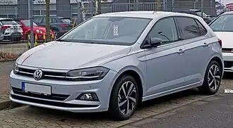Front-three-quarter view of a small front-engined five-door car with a two-box body style fitted with door mirrors, alloy wheels, flush headlamps, and fog lamps.