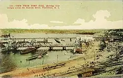 early 20th century photograph of four railroad bridghes across a river