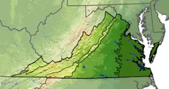Terrain map of Virginia divided with lines into five regions. The first region on the far left is small and only in the state's panhandle. The next is larger, and covers most of the western part of the state. The next is a thin strip that covers only the mountains. The next is a wide area in the middle of the state. The left most is based on the rivers which diffuse the previous region.