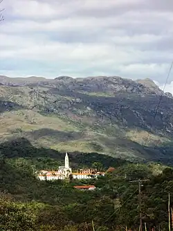A distant view of the Caraça Sanctuary.