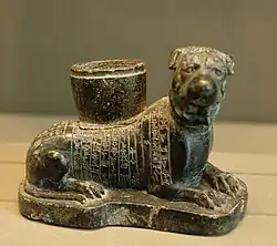 Votive statuette of a dog, an animal of Ninisinna/Gula, found in Girsu, early 2nd millennium BC; Louvre Museum.