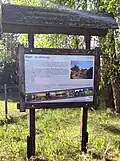 Information board on the Wąglik's history and naming, located in the northern part of the village