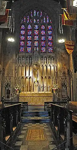 Altar and reredos (1916).