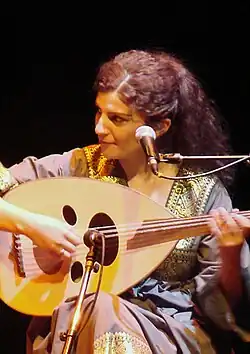 Waed Bouhassoun playing the oud at a concert in 2010.